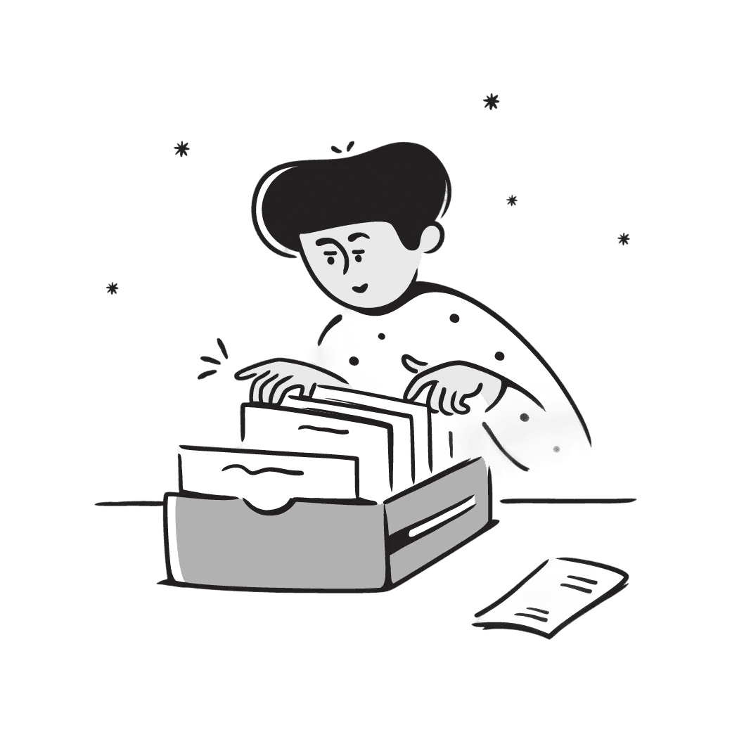 man looking through files